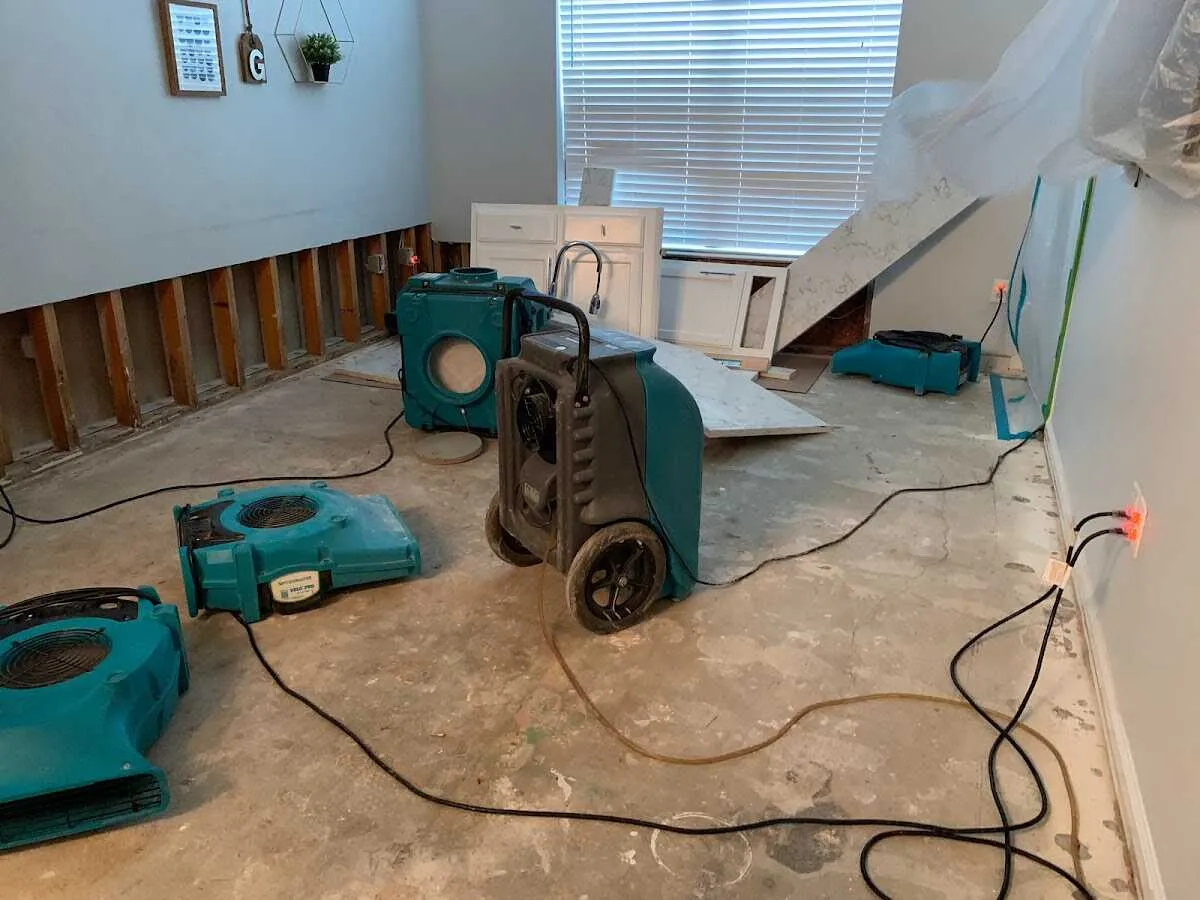 Dehumidifier in flood-cut room for Water Damage Restoration in Conway